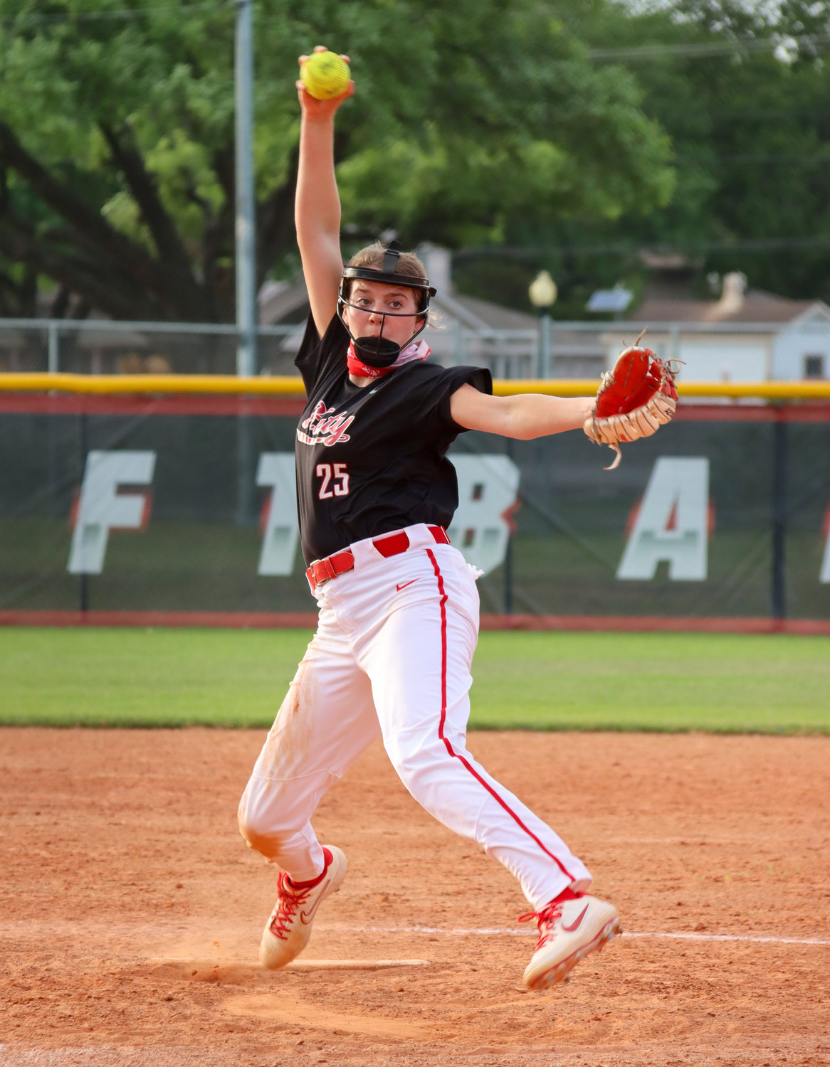 Katy High freshman Cameryn Harrison (25) delivers a pitch during a game against Cinco Ranch on Tuesday, April 6, at Katy High.
